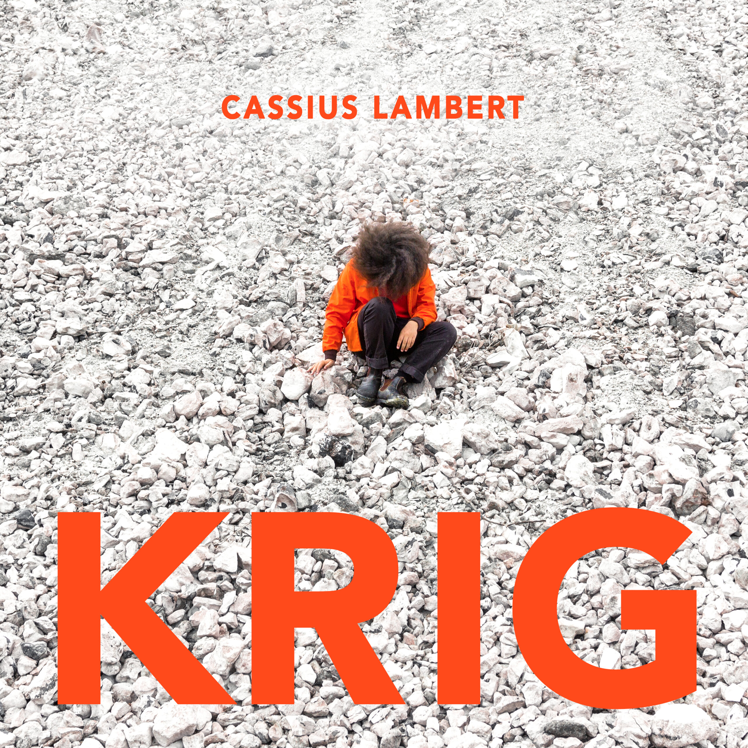 Cassius lamberts is sitting on white rocks. The name of the single is Krig.